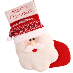 Knitted Christmas stocking with Santa Claus applique and Merry Christmas embroidery