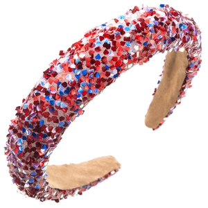 Detail view of the thick sequin headband with red blue sparkles and velvet lining