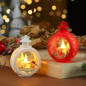 Festive Christmas LED lanterns with Snowman and Santa Claus scenes on wooden base