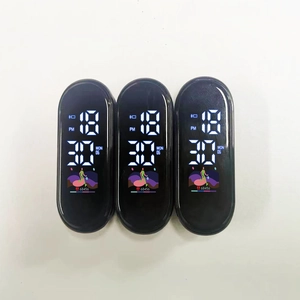 Three waterproof LED smart bracelet cores showing time and step count on white background