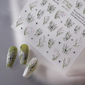 Silver embossed 3D nail stickers featuring butterfly and lily of the valley designs