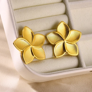 Retro geometric gold flower stud earrings in stainless steel with plumeria petal texture