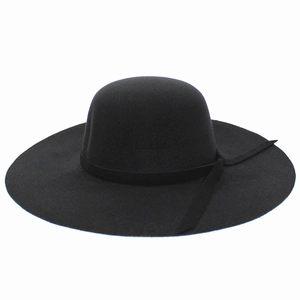Elegant black wide brim wool felt dome hat with ribbon accent for a classic winter style