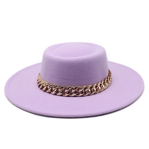 Detailed close-up of a lavender wool felt flat top boater hat with a chunky gold chain