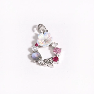 Silver flower wreath necklace with iridescent shell, colorful gemstones and butterfly pendant