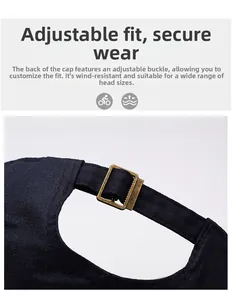 Detail view of the adjustable metal buckle on navy blue baseball cap for secure fit