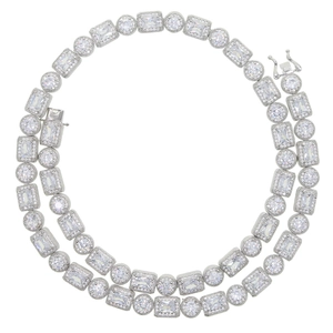 Detailed macro view of 8mm round and rectangular zircon link chain with silver plating