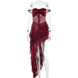 Red lace strapless dress with irregular ruffle hem and side trail shown on mannequin