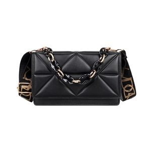 Chic black quilted crossbody bag with golden chain and stylish wide printed strap