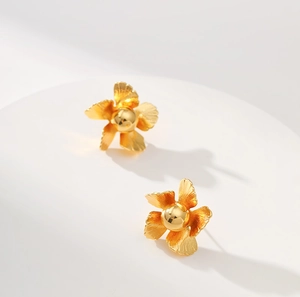 18K gold plated brass floral earrings with five-petal flower design on white stand