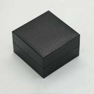 Square black faux leather watch box with lychee texture and secure flip top cover