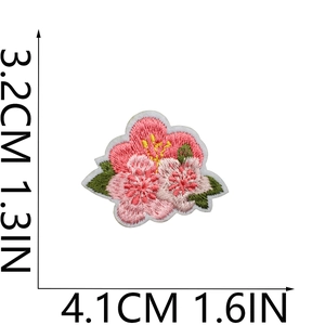 Macro detail of cherry blossom embroidery patch with dimensions 3.2cm by 4.1cm