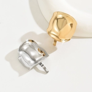 French style metal hair clips in gold and silver with unique textured wave pattern
