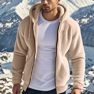 Detail of warm beige fleece hoodie jacket with heavy texture for men in outdoor snow scene