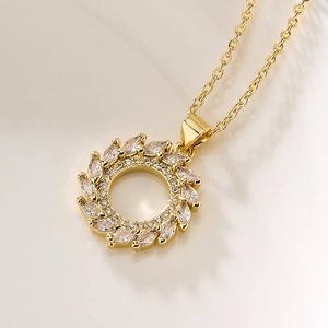 Elegant gold plated geometric zircon pendant necklace for women on a beige background