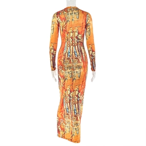 Close-up of long sleeve printed bodycon dress with orange tropical pattern on white backdrop