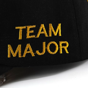 Close-up of Team Major embroidery on a vintage black washed cotton baseball cap