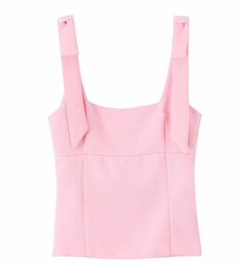 Detail view of a slim-fit pink tank top with a square neckline and wide straps