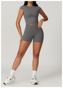 Detail of dark grey seamless yoga set with high waist compression shorts and crop top