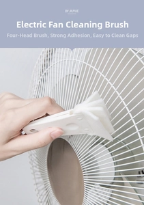 Detail showing hand using four-layer fiber cleaning brush on electric fan grilles