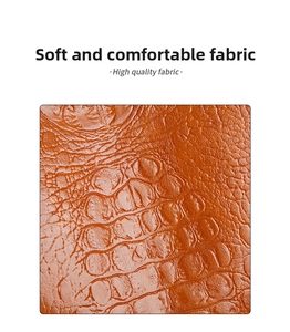 Macro detail of high-quality brown crocodile texture leather with glossy finish