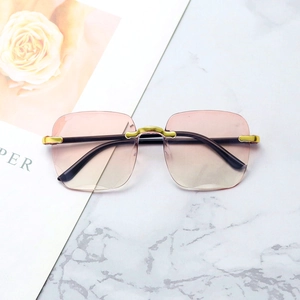 Frameless rimless sunglasses with pink yellow gradient lenses and metal frames