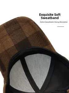 Detail of soft cotton sweatband inside a brown plaid baseball cap for better comfort