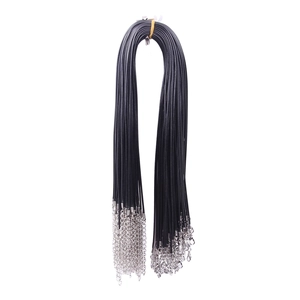 Detail of black wax cord necklace with silver lobster clasp and extension chain