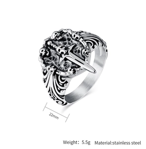 Detail view of gothic skull sword ring showing 22mm width and stainless steel texture