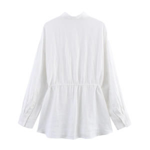 Detailed back view of white linen long-sleeve shirt with drawstring waist and flared hem