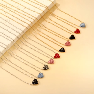 Elegant heart pendant necklace set with colorful pavé rhinestones in gold and silver finish