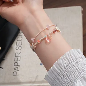 Handmade woven double-layer shell bracelet with pink starfish and teardrop pendant