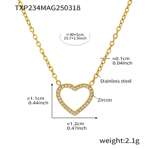Detail of gold heart pendant with zircon inlay on 40+5cm stainless steel chain