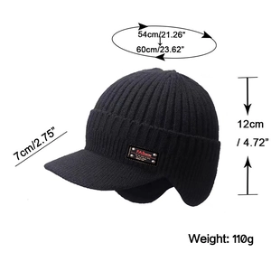 Black winter knit trapper hat with visor and ear protection showing size dimensions