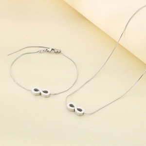 Polished stainless steel infinity symbol necklace and adjustable bracelet set in silver