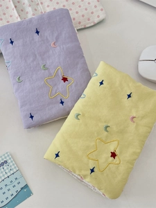 Quilted fabric passport holder set with star embroidery in purple and yellow colors
