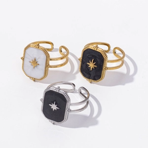 Three eight-pointed star enamel rings in gold and silver finish with open adjustable bands