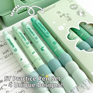 Detail of four mint green ST nib gel pens with soft modular grips on a notebook
