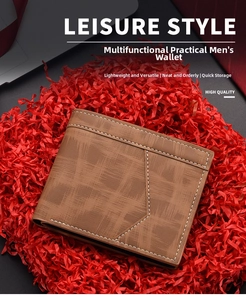 Detailed view of brown textured men's short wallet with white stitching on red confetti