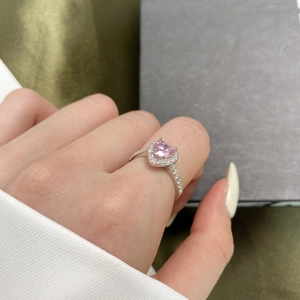 Elegant S925 silver ring featuring a large pink heart-shaped stone with pavé diamonds