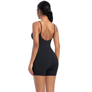 Detail of black seamless yoga bodysuit featuring slim straps and U-shaped back design