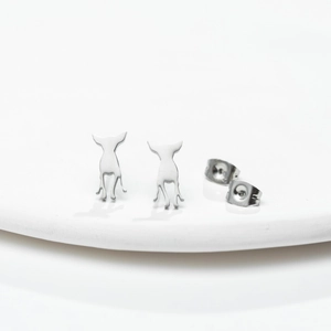 Minimalist silver dog silhouette stud earrings with matching butterfly backings