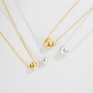 Elegant S925 sterling silver beaded necklace with brushed gold and silver finishes