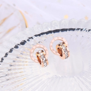 Rose gold titanium earrings with roman numerals and pavé cubic zirconia double hoops