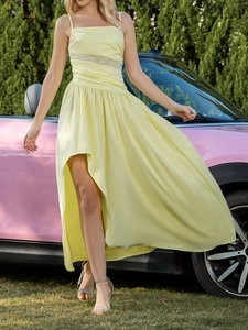 Pale yellow ruffled strap maxi dress with lace inserts and asymmetrical hem for summer