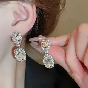 Elegant silver oval crystal earrings with double-layered pavé diamond halo for women