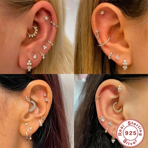 Detailed close-up of S925 sterling silver earrings set with sparkling zircon stones