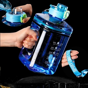 Blue 2.2L large sports water bottle with time markers and convenient carry strap