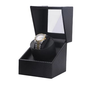 Single automatic watch winder in black carbon fiber finish with clear viewing window