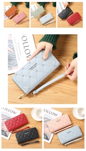 Detail der Nähte und des Reißverschlusses dieser großen Kunstleder-Brieftasche für Damen